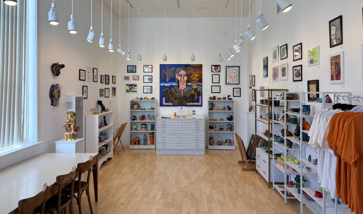 An interior photo of a large, well-lit art gallery